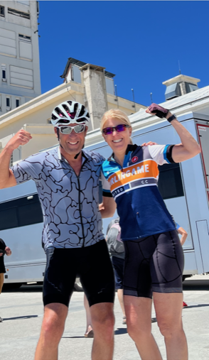 Man and woman in cycling gear